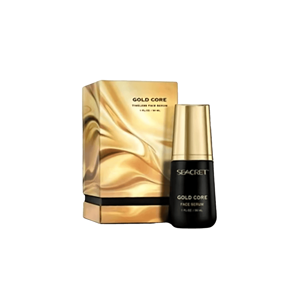 Seacret Gold Core face serum bottle next to its golden packaging box.